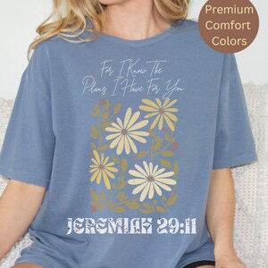 Trendy Christian Comfort Colors T-shirt with a Bible verse and floral print, perfect for a faith-based gift or church-going outfit.