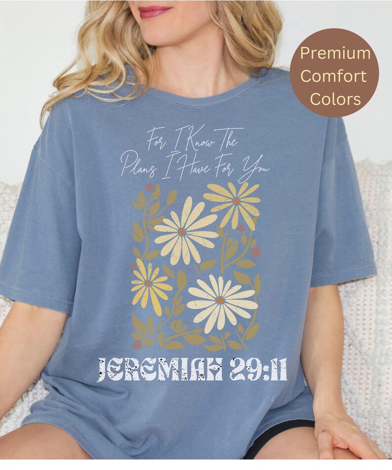 Trendy Christian Comfort Colors T-shirt with a Bible verse and floral print, perfect for a faith-based gift or church-going outfit.