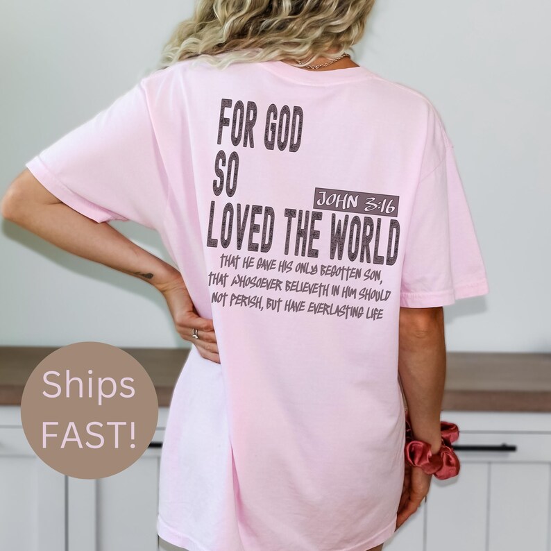 Christian oversized T-shirt displaying “For God So Loved The World,” making it a great scripture-based gift for women or men with strong faith.