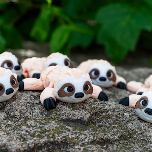 Preguiça articulada impressa em 3D: brinquedo inquieto flexível