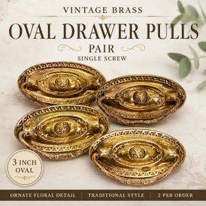 May include: Four vintage brass oval drawer pulls with ornate floral details and a single screw mounting design. Each pull features a central flower motif surrounded by decorative borders. A circular label indicates a 3 inch oval size.