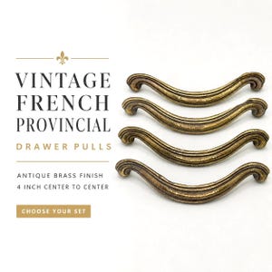 May include: Four curved drawer pulls with an antique brass finish, each featuring a 4 inch center to center measurement. The text reads: VINTAGE FRENCH PROVINCIAL DRAWER PULLS, ANTIQUE BRASS FINISH, 4 INCH CENTER TO CENTER, CHOOSE YOUR SET.