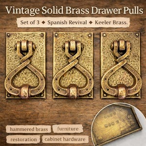 May include: Three vintage solid brass drawer pulls with a Spanish Revival design. Each pull features an ornate, hammered brass design with a twisted handle and heart-shaped details. The image includes the text "Vintage Solid Brass Drawer Pulls" and "Set of 3".