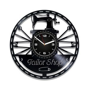 May include: Black vinyl record clock with a sewing machine design and the text "Tailor Shop". The clock face has a black background with white numbers and hands.