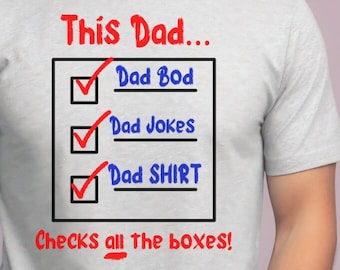 May include: A gray t-shirt with the text "This Dad..." and a checklist with the items "Dad Bod", "Dad Jokes", and "Dad Shirt" all checked. The text "Checks all the boxes!" is below the checklist.