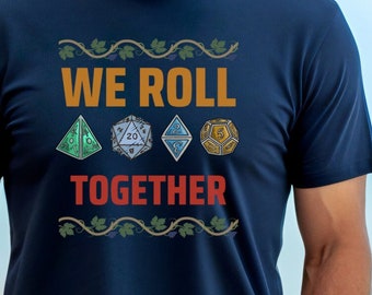 May include: A navy blue t-shirt with a white vine design and the text "WE ROLL TOGETHER" in yellow and red. There are five colorful dice in the center of the shirt.