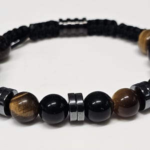 Men&#39;s or Women&#39;s Triple protection macrame bracelet featuring Tiger eye beads, hematite heishi beads, and black obsidian.