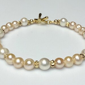 Elegant peach and high quality ivory genuine freshwater pearl bracelet (Pearl is June Birthstone)
