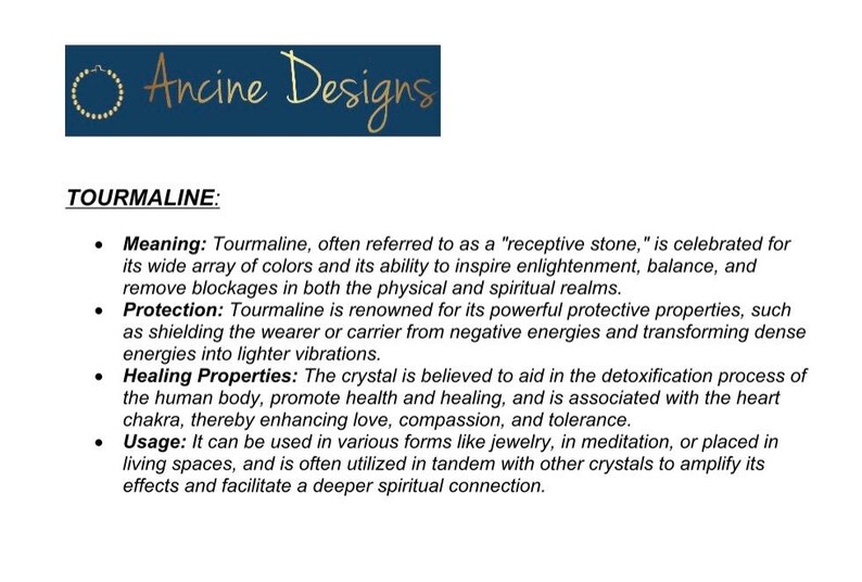 May include: Tourmaline, a crystal known for its wide array of colors, is believed to inspire enlightenment, balance, and remove blockages in both the physical and spiritual realms. It is also said to protect against negative energies and promote healing.