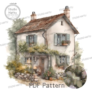 May include: A watercolor painting of a small, white cottage with a brown tiled roof. The cottage has a porch with a wooden bench and a small table. There are flowers and plants growing around the cottage. The painting is surrounded by a border of the text "Studio Haftu" in a cursive font. The text "PDF Pattern" is also included in the image.