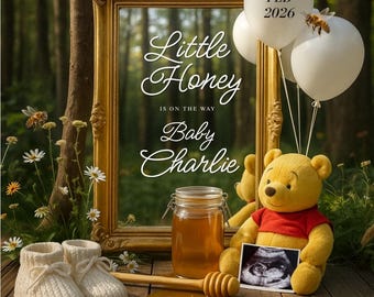 May include: A Winnie the Pooh-themed baby announcement with a gold framed mirror, white balloons, and a jar of honey. The text reads "Little Honey is on the Way Baby Charlie" and "FEB 2026". Includes a pair of white baby booties and a honey dipper.