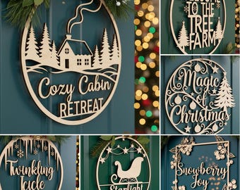 May include: A collection of wooden Christmas-themed signs. The signs feature various designs, including a cabin scene with the text "Cozy Cabin Retreat", a sleigh with "Starlight Sleigh", and "Snowberry Joy".