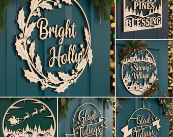 May include: A collection of wooden Christmas decorations. The decorations include a round wreath with the words "Bright Holly", a square sign with "Snowy Pines Blessing", and a round sign with "Snowy Village". Other signs say "Glad Tidings".