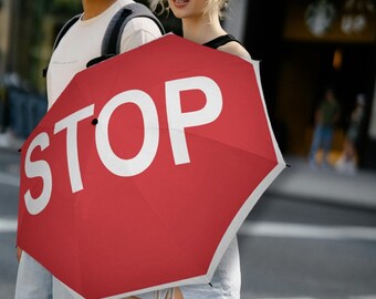 stop sign umbrella, when you cross the road with small kids it helps stop the traffic
