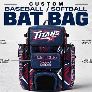 May include: A custom baseball and softball bat bag in navy blue, red, and white with an all-over geometric print. The bag features the text TITANS, SANCHEZ, and the number 22, with mesh side pockets, bat sleeves, and labeled callout text.