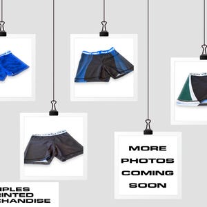 May include: Four images of printed athletic shorts. The first image shows blue shorts with a white waistband. The second image shows black and blue shorts with a white waistband. The third image shows black and green shorts with a white waistband. The fourth image says "More Photos Coming Soon".