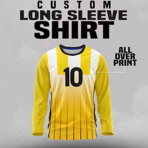 May include: A long-sleeve shirt with a yellow and white design, featuring the number 10 in black. The shirt has a black collar and vertical black stripes. Text at the top reads "CUSTOM LONG SLEEVE SHIRT" and "ALL OVER PRINT".