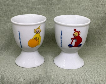 2 Teletubbies egg cups with Po and Laa-Laa