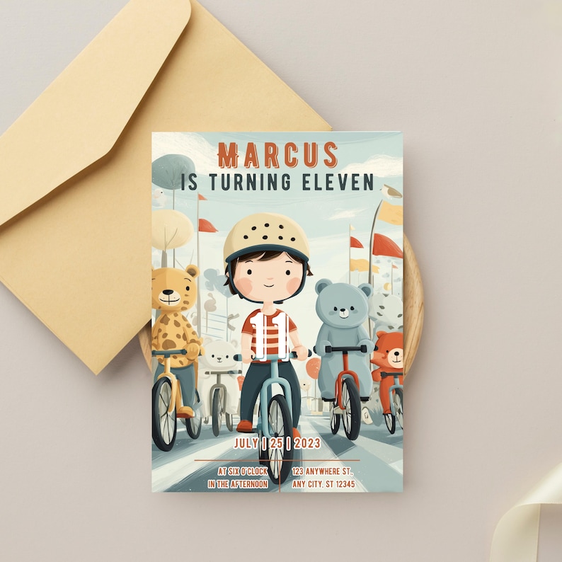 May include: A birthday invitation featuring a cartoon illustration of a boy on a bicycle, surrounded by teddy bears on bikes. The text reads "MARCUS IS TURNING ELEVEN" with the date "JULY 25 2023". An envelope is in the background.