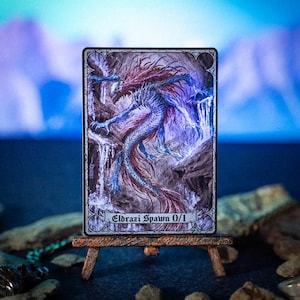 Prole Eldrazi 0/1, criatura incolor, ficha SURGE metalizada de MTG