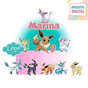 May include: A pink cake decorated with various Pokémon characters, including Eevee, Espeon, and others. The cake is adorned with the name "Marina" and the number "9". The image also includes the text "ARQUIVO DIGITAL" and "Lepe Scrap".