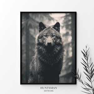 May include: A black and white photograph of a wolf standing in a forest. The wolf is looking directly at the camera. The image is framed in a black frame.