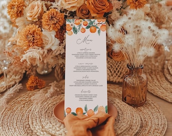 May include: A printable wedding menu with a watercolor illustration of oranges and leaves. The menu features appetizers, main course, sides, and desserts. The text includes: Citrus Caprese Skewers, Mandarin Honey Goat Cheese Crostin, Citrus Herb Roasted Chicken, Tangerine & Fennel Salad, Orange Blossom Honey Cake, and more.