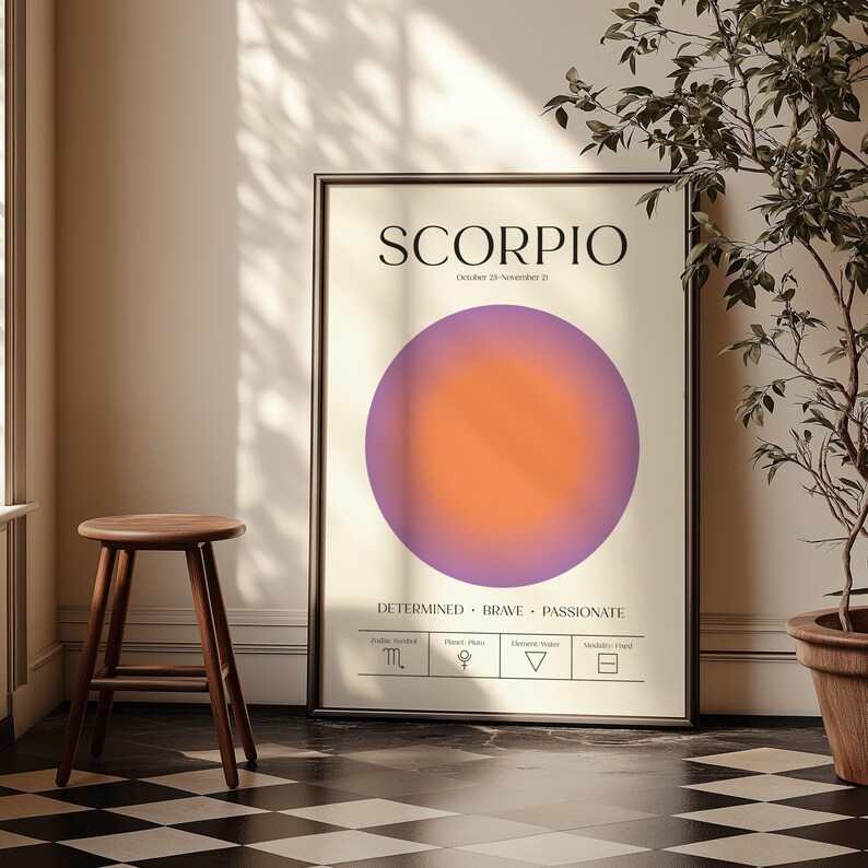 May include: Framed Scorpio zodiac sign art print. The poster features the word "SCORPIO" at the top, with the dates October 23 - November 21 below. A purple and orange gradient circle is in the center. The bottom has the words "DETERMINED BRAVE PASSIONATE".