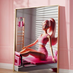 May include: A pink and white doll wearing a pink sports bra and shorts is sitting on a pink pilates reformer in a room with white blinds. The doll has long pink hair and is wearing a pink headband.