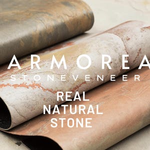 May include: Close-up of rolled stone veneer samples in shades of gray, beige, and rust. The text "MARMOREAL STONE VENEER REAL NATURAL STONE" is displayed in white, highlighting the product's natural stone composition.