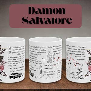 Peut inclure: Une tasse en céramique blanche avec une anse noire et le texte "But First, Coffee" en noir, dans une police manuscrite. La tasse est posée sur une surface blanche.
