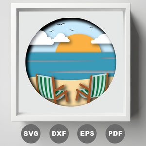 May include: A paper cut-out design of a beach scene with two green and white striped chairs, a blue ocean, a yellow sun, and white clouds.