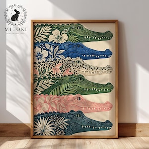 May include: A framed vertical art print featuring six stacked crocodile heads in different colours including green, blue, cream, and pink. Each crocodile is integrated with botanical floral and leaf patterns. The text MITOKI is at the top left.