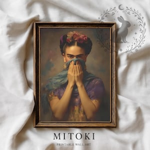 May include: Framed print of a woman with a floral headpiece, covering her face with a blue scarf. The artwork features a vintage aesthetic with a dark wooden frame. The print has the text "MITOKI PRINTABLE WALL ART" at the bottom.