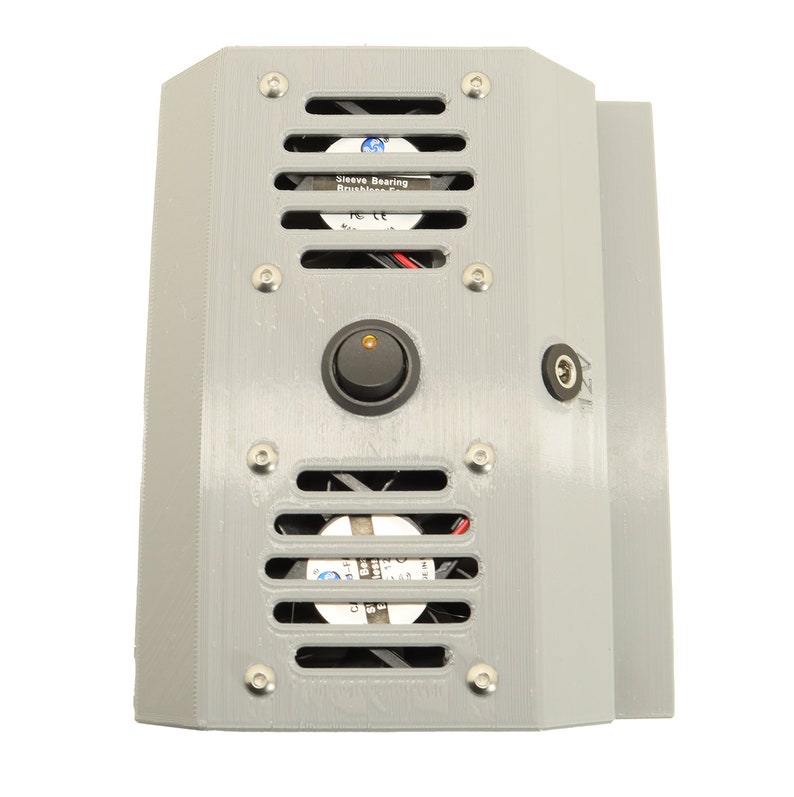 May include: A grey 3D printed enclosure with two small fans, a power switch, and a power cord connector. The fans have "Sleeve Bearing Brushless DC" labels.