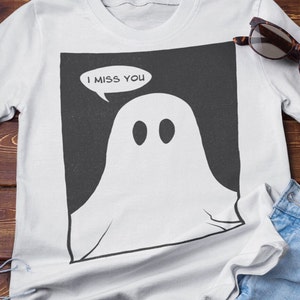 Schattig Ghost Vintage Tee schattig retro geïnspireerd cartoon grafisch T-shirt ontwerp voor liefhebbers en griezelige schattige Goth modeliefhebbers minimalistisch