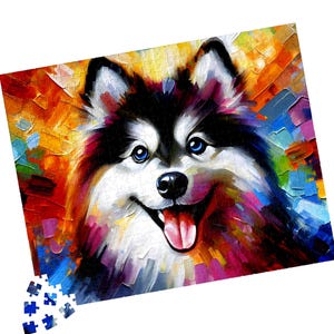May include: A rectangular jigsaw puzzle featuring a vibrant, impressionistic painting of a fluffy dog with blue eyes, black and white fur, and an open mouth with a pink tongue. The background consists of bold, colorful, textured brushstrokes.