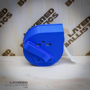 Layered Ballistics Paster Dispenser: Training Accessory