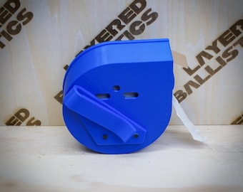 Layered Ballistics Paster Dispenser: Training Accessory