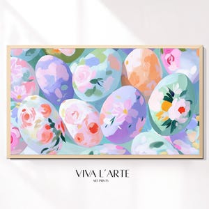 May include: A framed print of a colorful abstract painting featuring a cluster of pastel-colored eggs with floral designs. The eggs are arranged in a random pattern and are set against a light blue background. The print is titled "Viva L'Arte Art Prints".