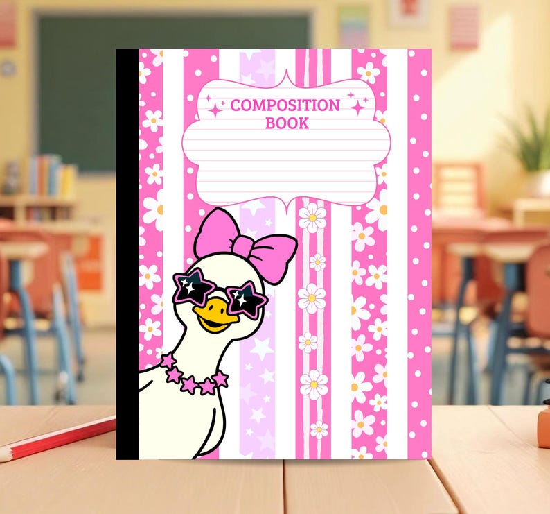 May include: A composition book with a pink and white striped cover featuring a white duck wearing a pink bow, star-shaped sunglasses, and a star necklace. The cover includes a white label area with the text COMPOSITION BOOK in pink letters.