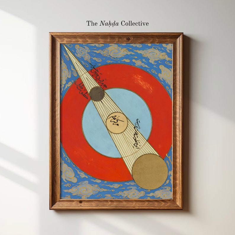 May include: A framed print of a colorful geometric design with a red circle, a blue circle, and a white line. The design is surrounded by blue clouds with gold accents. The print is titled "The Nahda Collective".