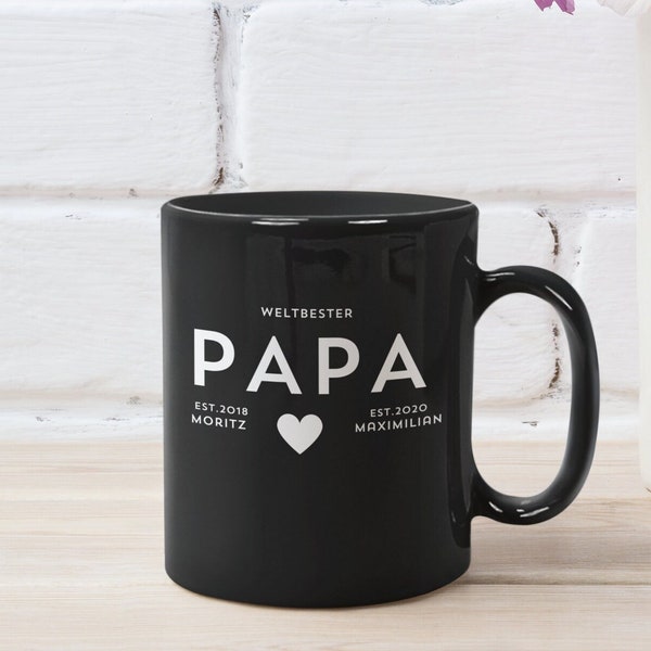 Vatertag Tasse personalisiert schwarz mit weißem Druck "Weltbester PAPA" mit Namen und Geburtsjahr der Kinder