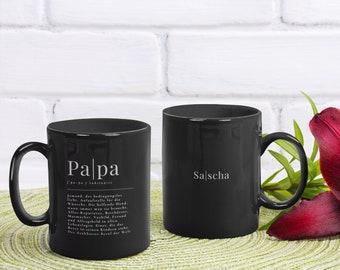 Vatertag Geschenk Tasse personalisiert schwarz mit weißem Druck "Papa - Definition" mit Name