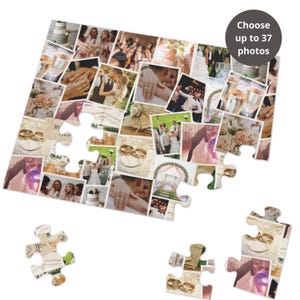 May include: A wedding photo puzzle with 37 spaces for photos. The puzzle is made of white cardboard and has a collage of wedding photos on it. The puzzle is partially assembled, with some pieces missing.