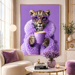 May include: A wall art print featuring a leopard wearing purple-tinted glasses and a fluffy purple faux fur coat. The leopard is holding a purple coffee mug with latte art. The background is a solid, vibrant purple colour.