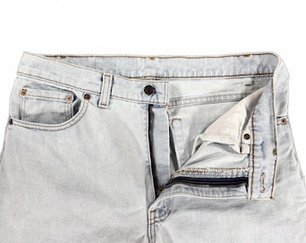 Vintage Levi's 550 USA Made Distressed Light Wash Jeans 33x30