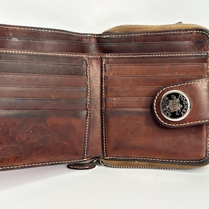 Vintage  Dooney & bourke  two tone brown pebbled  leather wallet with  snap signature medallion- zip around- many slots- unisex FREE SHIP!