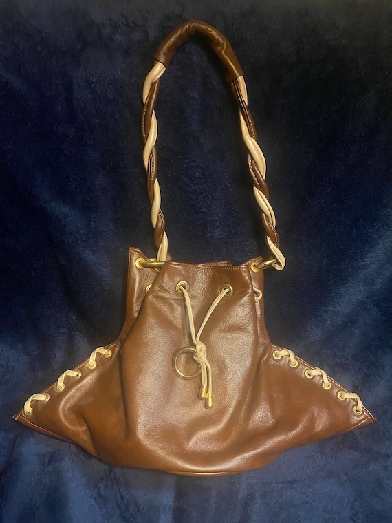 Jewell: US Patent, Australian Leather, Brass