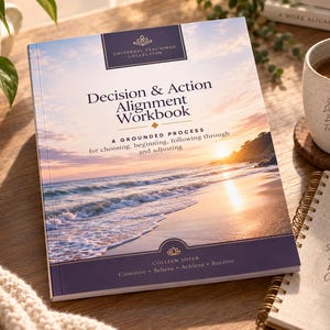 May include: A softcover workbook titled Decision & Action Alignment Workbook: A Grounded Process for choosing, beginning, following through and adjusting. The cover features a sunset over an ocean beach with dark purple accents and text.